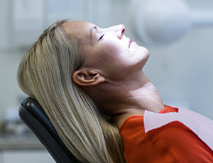 Relaxing woman in dental chair