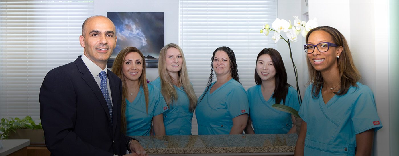 The Premier Dental Care team smiling in Herndon dental office