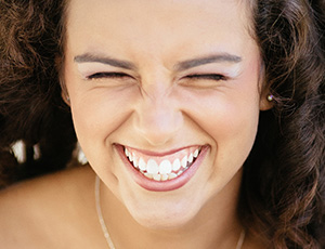 Laughing woman with flawless smile
